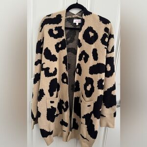 Leopard print long sweater. New without tags. Size L.